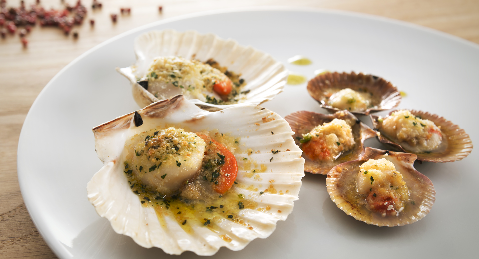 capesante gratinate e impiattate